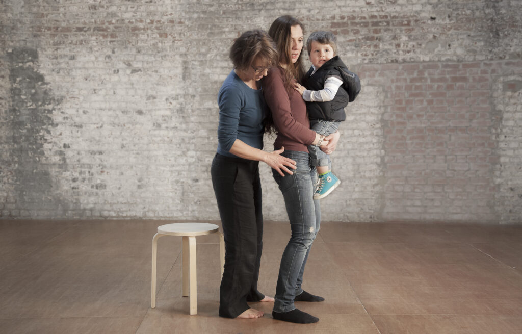 profe alumne amb nen a coll 1